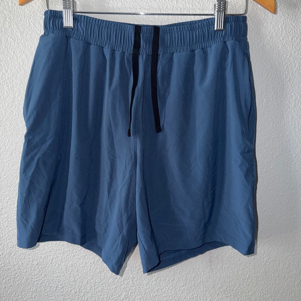 Beyond Yoga Blue Lined Performance Athletic Shorts Size S Zip Pocket Stretch